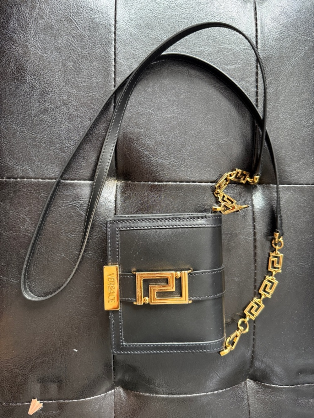 Versace Black Leather Crossbody Wallet with Gold Greek Key Chain Strap. Like new